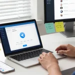 Using Telegram Chinese interface in a modern workspace for effective communication.